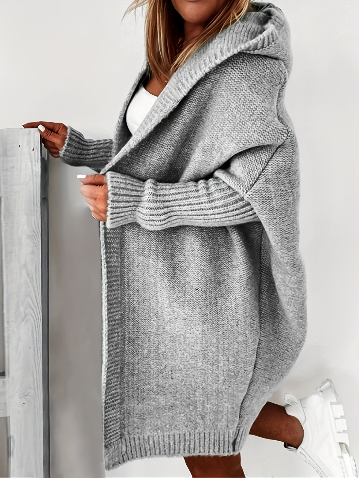 Übergroße Strickjacke mit Kapuze