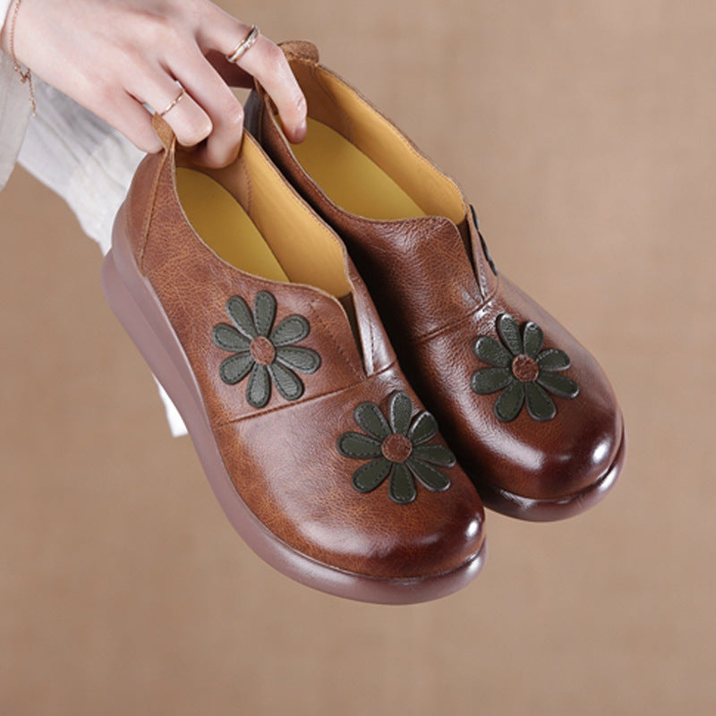 Loafer mit besticktem Blumenkeil und Keilabsatz aus Leder