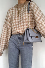 Pull tricoté kaki pied-de-poule géométrique