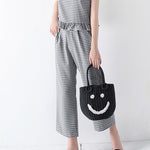 Sac tissé seau Smiley en paille