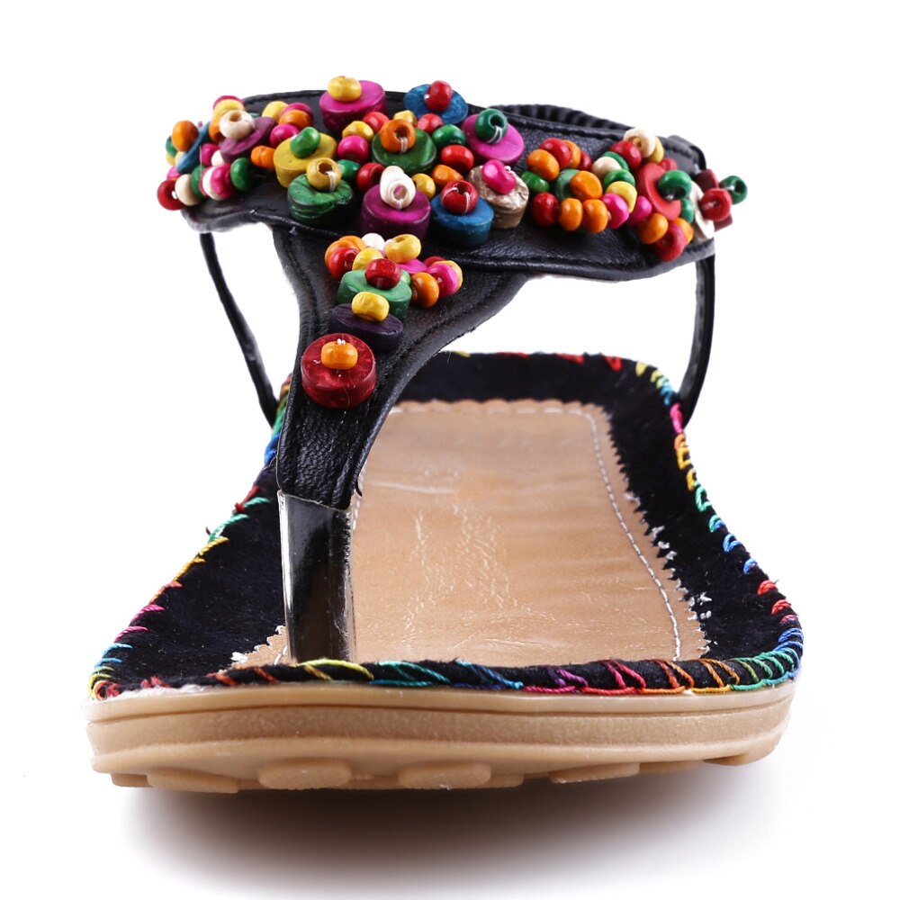 Sandales plates gladiateur avec chaînes et perles