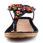 Sandales plates gladiateur avec chaînes et perles