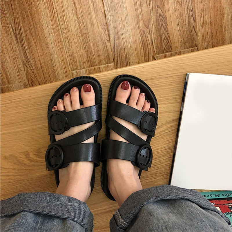 Pantoufles plates gladiateur en PU