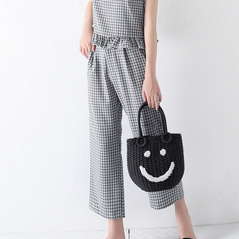 Sac tissé seau Smiley en paille