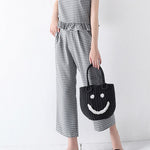 Sac tissé seau Smiley en paille