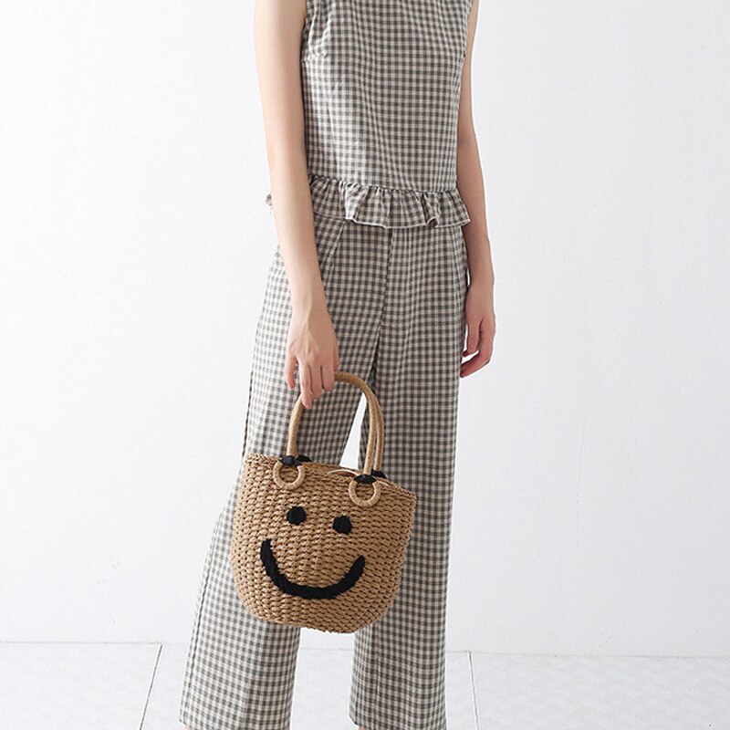Sac tissé seau Smiley en paille