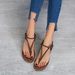Flache Flip-Flop-Sandalen mit dreieckigem Riemen
