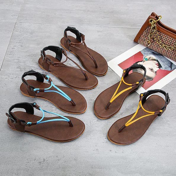 Flache Flip-Flop-Sandalen mit dreieckigem Riemen