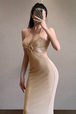 Robe midi moulante en tricot dos nu à bandes