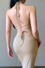 Robe midi moulante en tricot dos nu à bandes