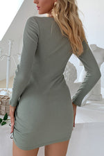 Robe en maille smockée à manches longues