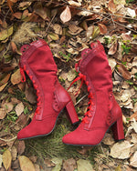 Bottes mi-mollet à lacets et talons hauts à bords creux