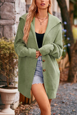 Manteau tricoté mi-long à trois boutons à col revers