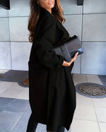 Eleganter Wollmantel mit Wasserfallkragen und offenem Gürtel vorne