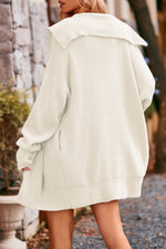 Manteau tricoté mi-long à trois boutons à col revers