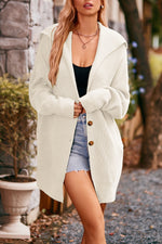 Manteau tricoté mi-long à trois boutons à col revers