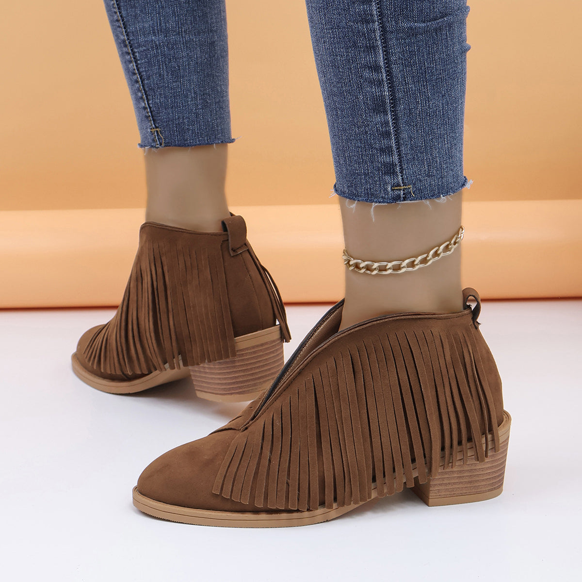 Spitze Retro-Lederstiefel aus Wildleder mit Fransen