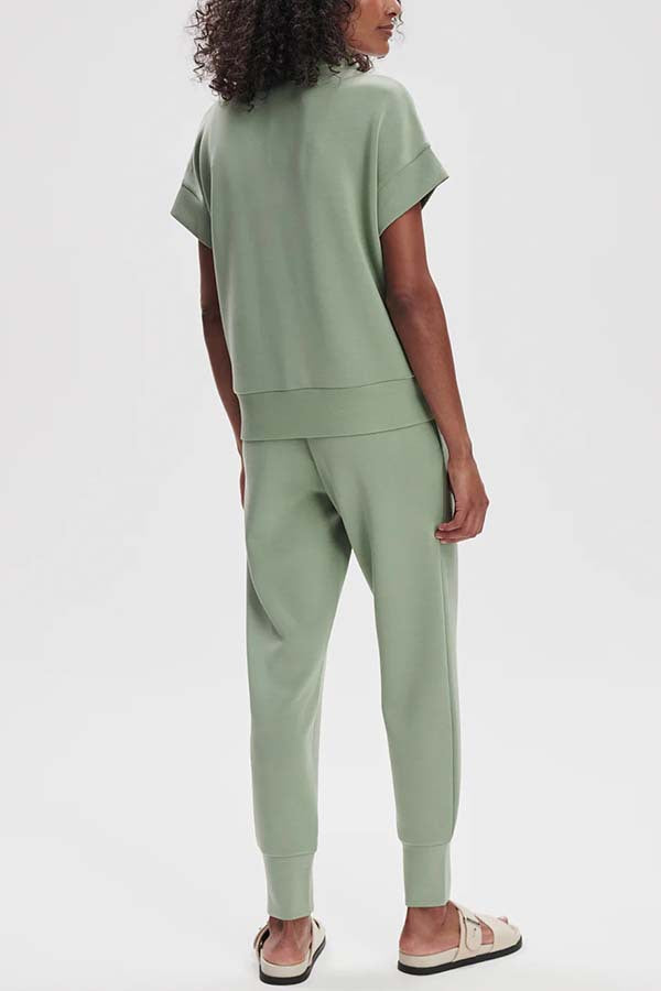 Stand-up collar half-zip short-sleeve top and tapered sweatpants two-piece set