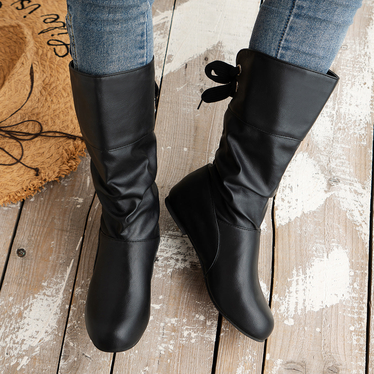 Bottines mi-mollet à bout rond et nœud arrière