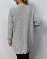 Solid color pocket mid-length knitted cardigan