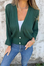 Pull ample boutonné à la taille et col en V