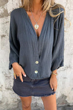 Low-cut V-neck button-down cotton and linen shirt