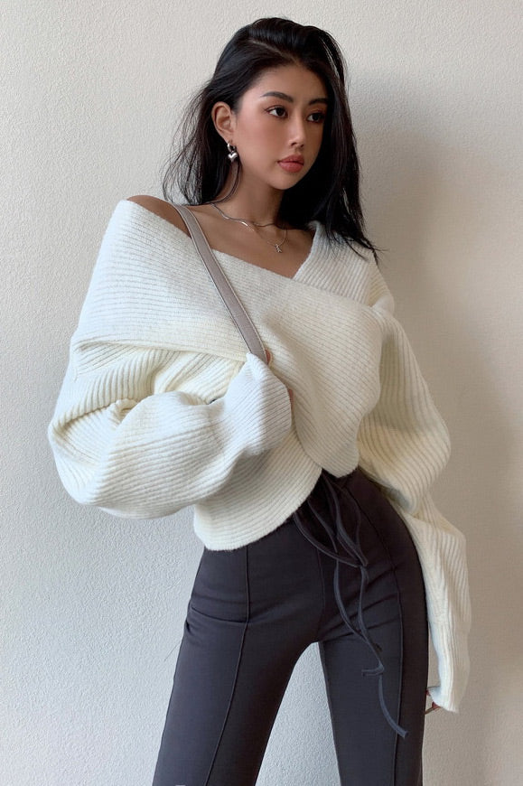 Off-the-shoulder cross-over asymmetrical cropped sweater