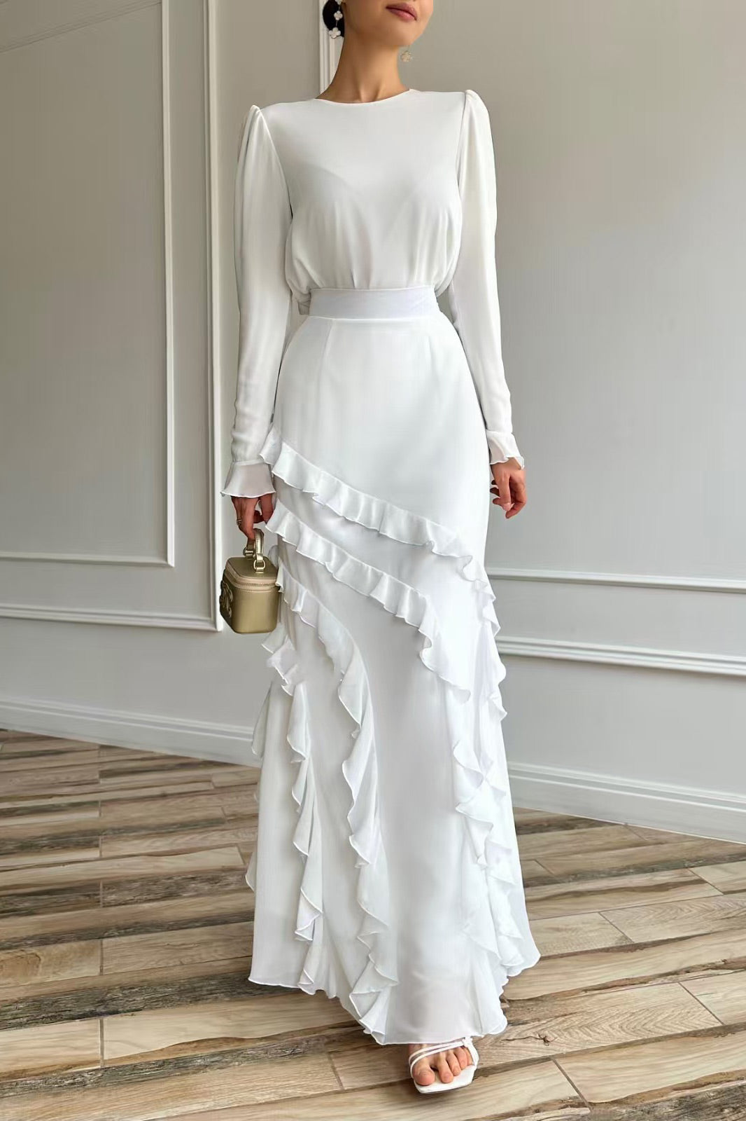 Long-sleeved top with ruffled hem and fitted long skirt two-piece set