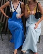 V-Ausschnitt Ärmellos Farbblock Breiter Saum Kleid