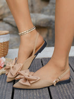 Large bow pointed toe flat heel sandals