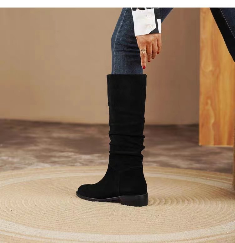 Bottes noires hautes en daim élégantes