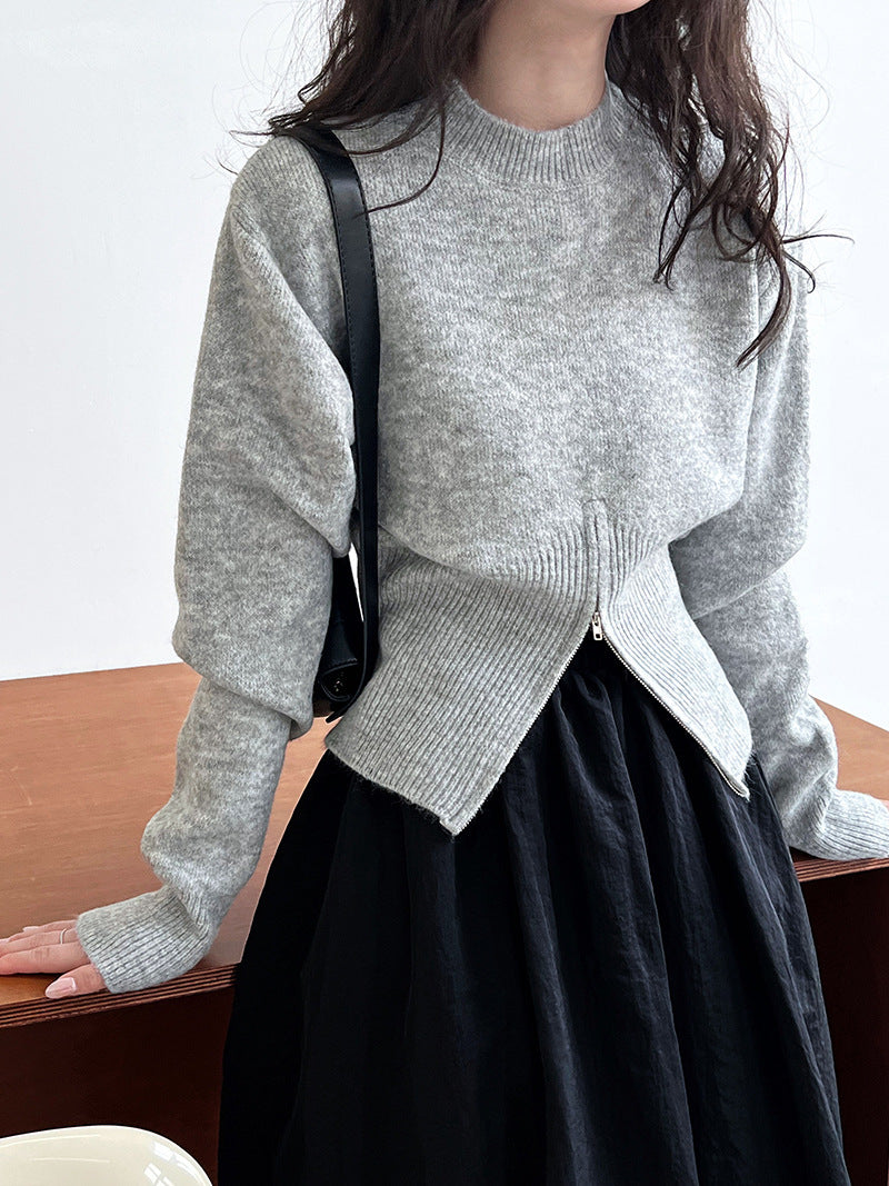 Pull zippé à col rond et taille cintrée