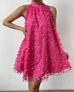 Mini-robe dos nu en maille avec appliques florales