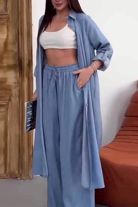 Costume de couleur unie avec manteau long à simple boutonnage et pantalon large