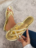 Flache Sandalen mit gewebtem Zehenring in Gold und Silber