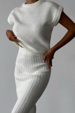 Sleeveless knitted pullover top and fitted long skirt two-piece set