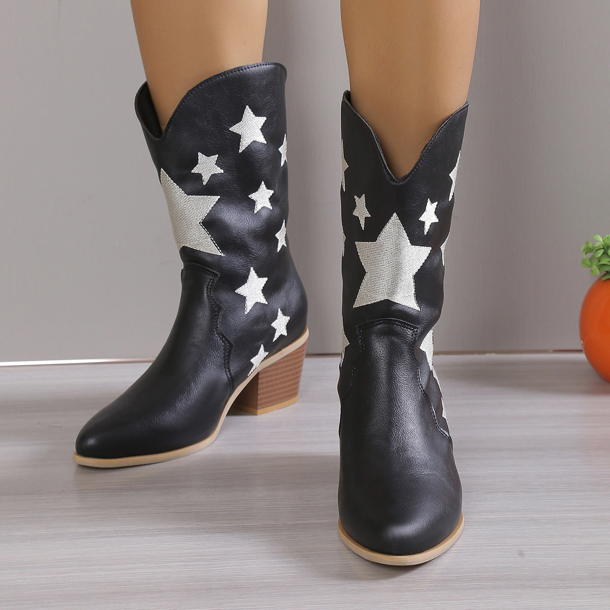 Bottes Martin à bout pointu et talon bloc à motif étoilé
