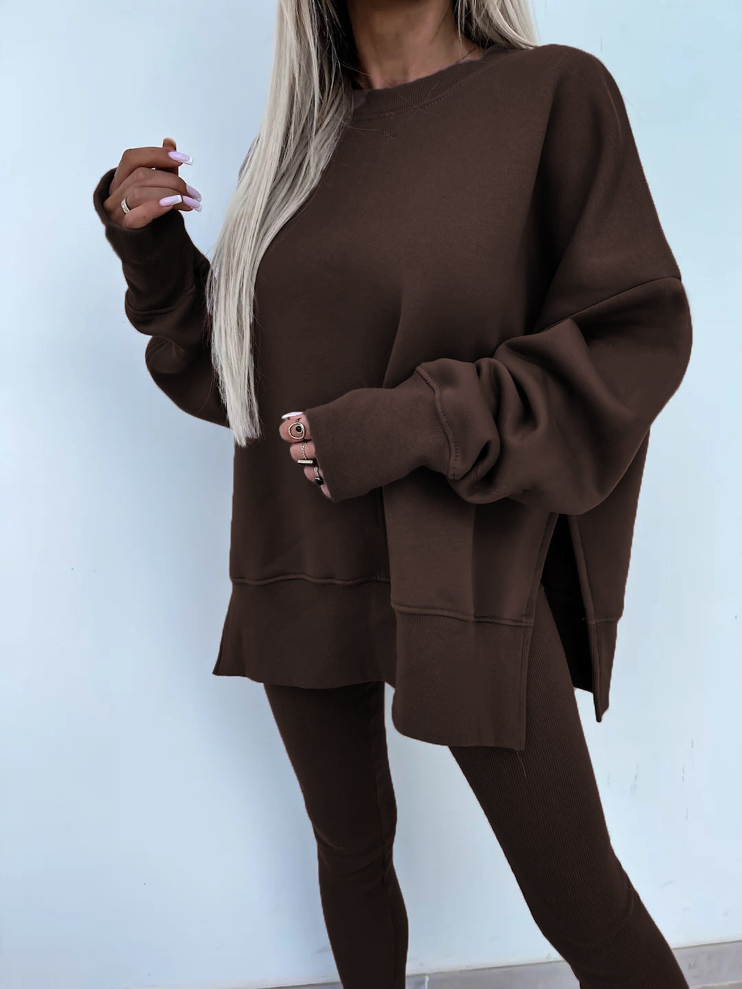 Loose long-sleeved round neck slit top and tight pants two-piece set