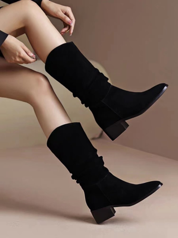 Bottes noires hautes en daim élégantes