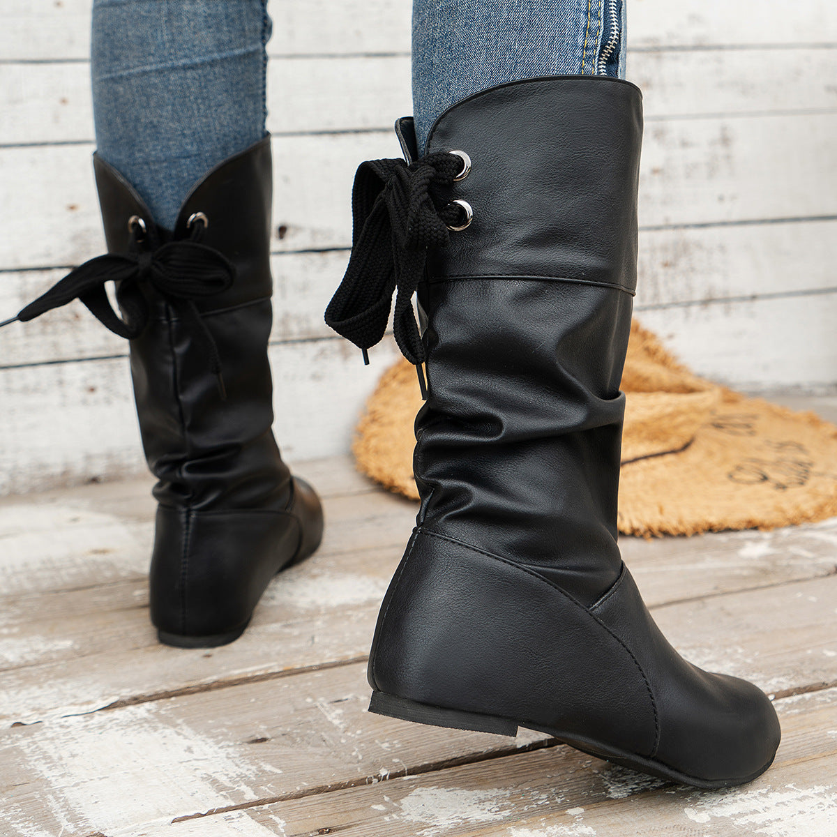 Bottines mi-mollet à bout rond et nœud arrière