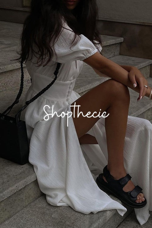 Elegant white short puff sleeved fitted slit maxi dress