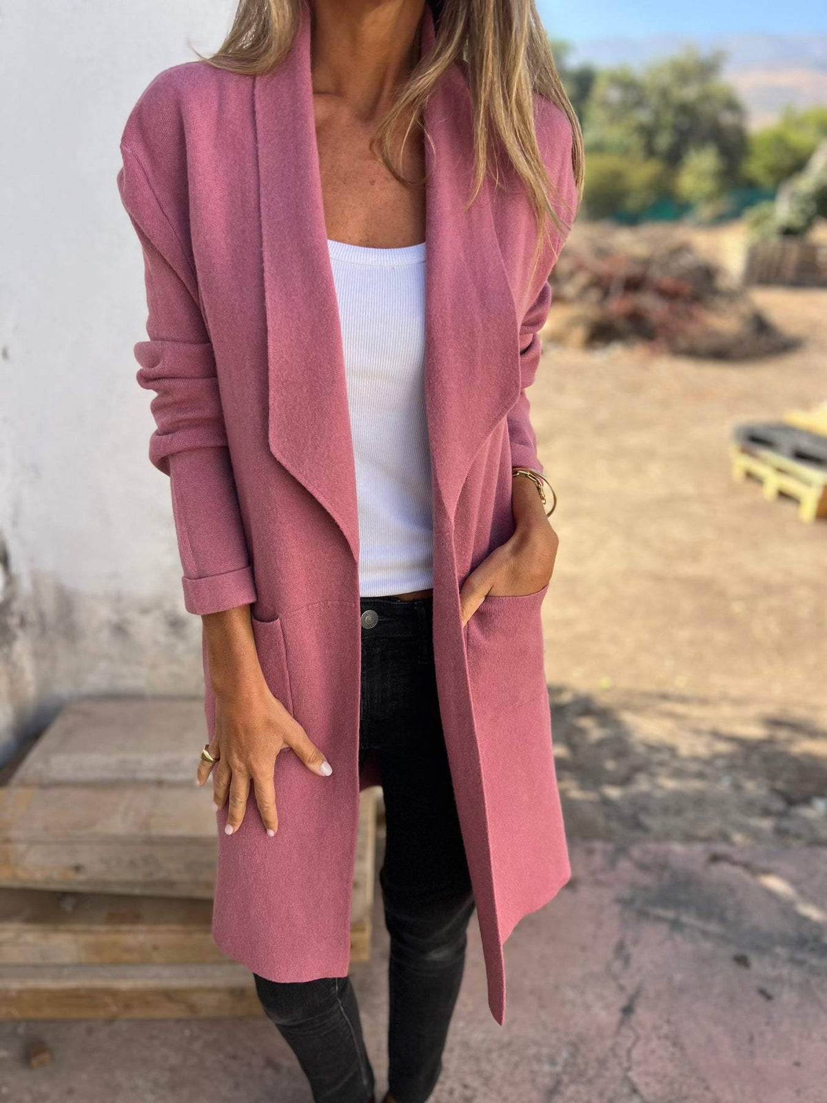 Cardigan de lã com bolso longo e cor sólida com lapela