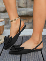 Large bow pointed toe flat heel sandals