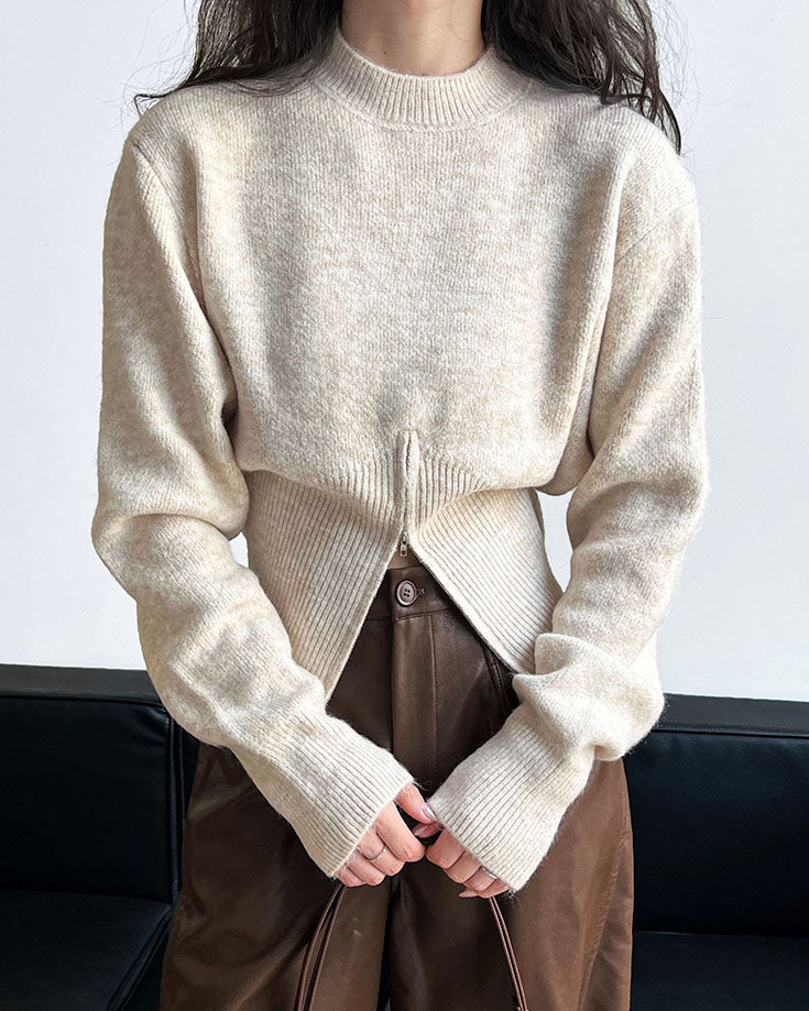 Pull zippé à col rond et taille cintrée