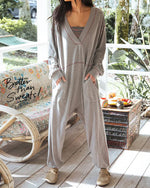 Jumpsuit mit V-Ausschnitt, breitem Revers und tiefem Schritt