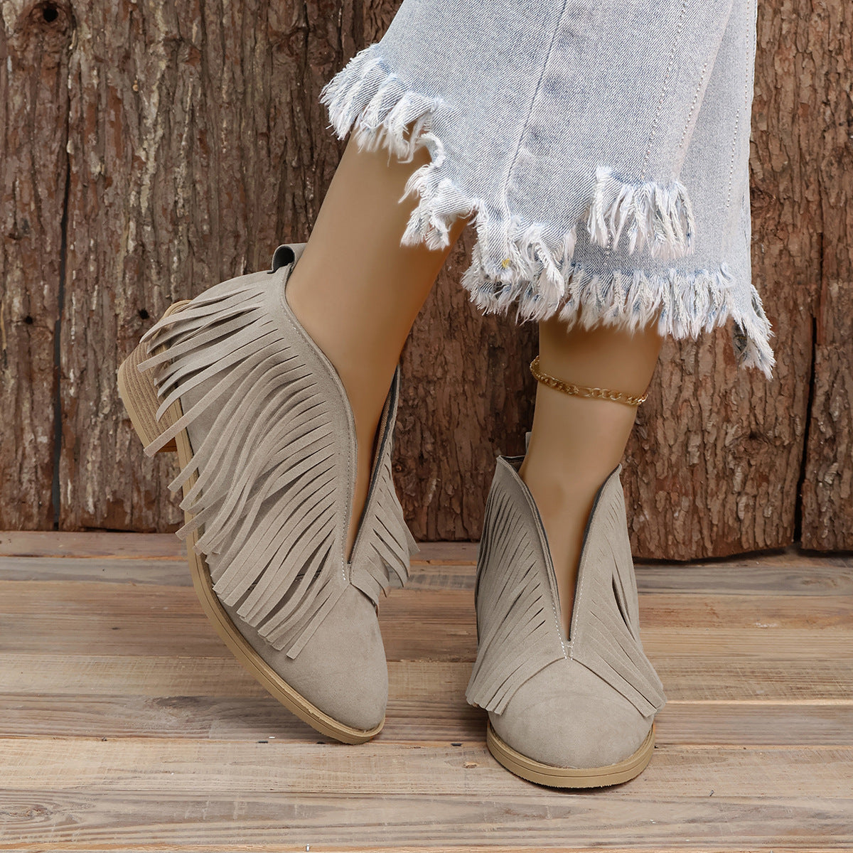 Spitze Retro-Lederstiefel aus Wildleder mit Fransen