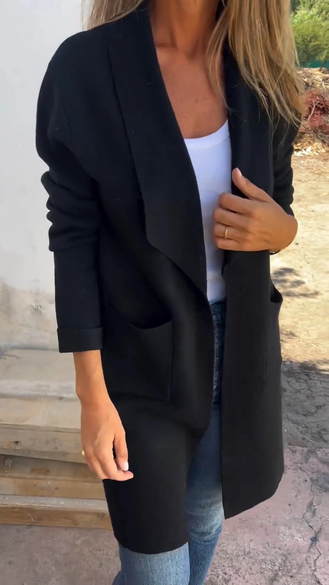 Cardigan de lã com bolso longo e cor sólida com lapela