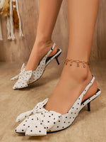Sandales à talons hauts à pois et nœud arrière