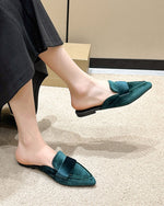 Pantoufles mules à bout pointu en daim