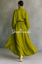 Green cotton-linen turtleneck top and pleated skirt set